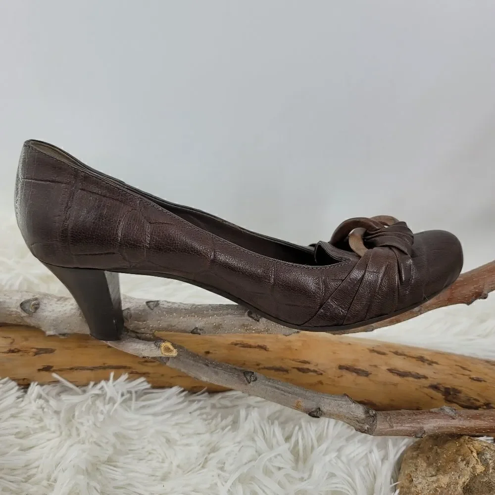 Henry Beguelin leather pumps with wood link accent (K)